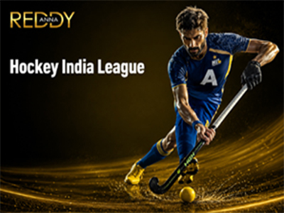 Indian player dribbling in the Hockey India League